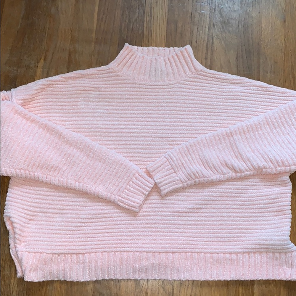 Pink turtleneck sweater